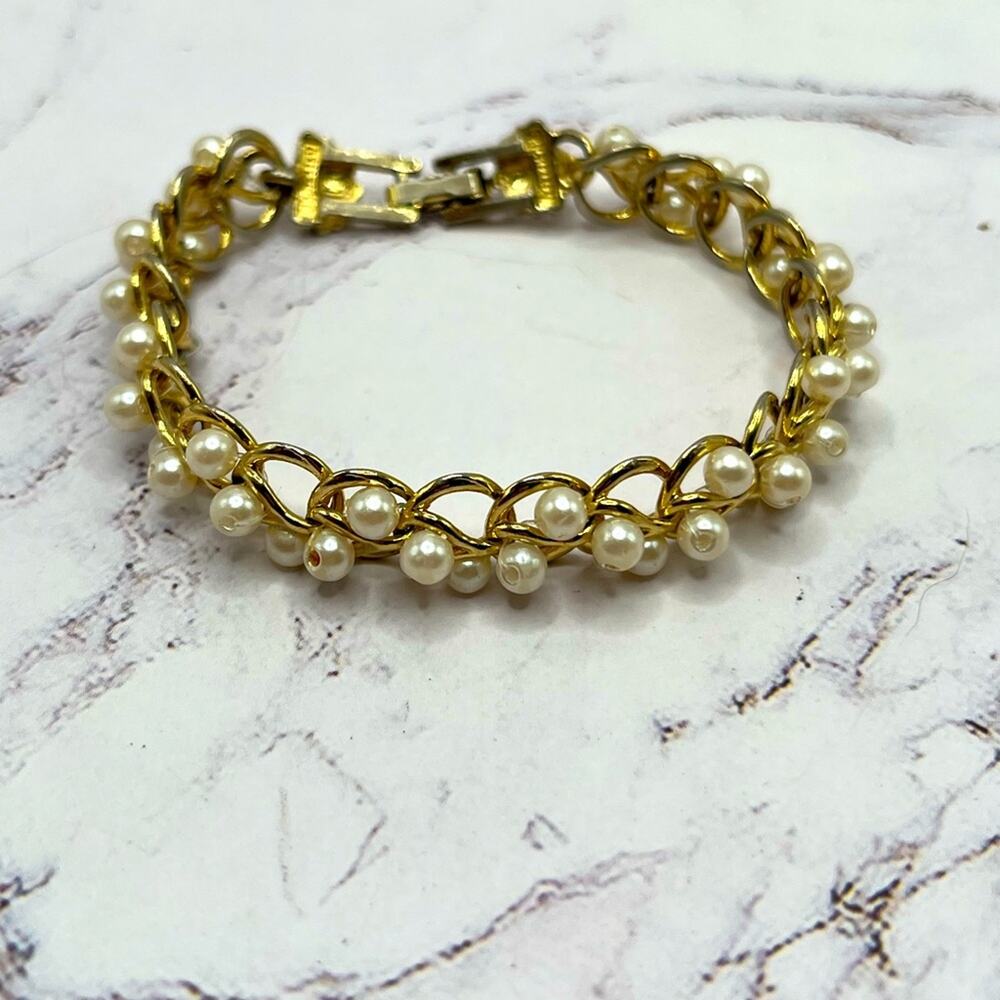 Vintage Richelieu gold tone, faux pearl chain bracelet with seashell clasp